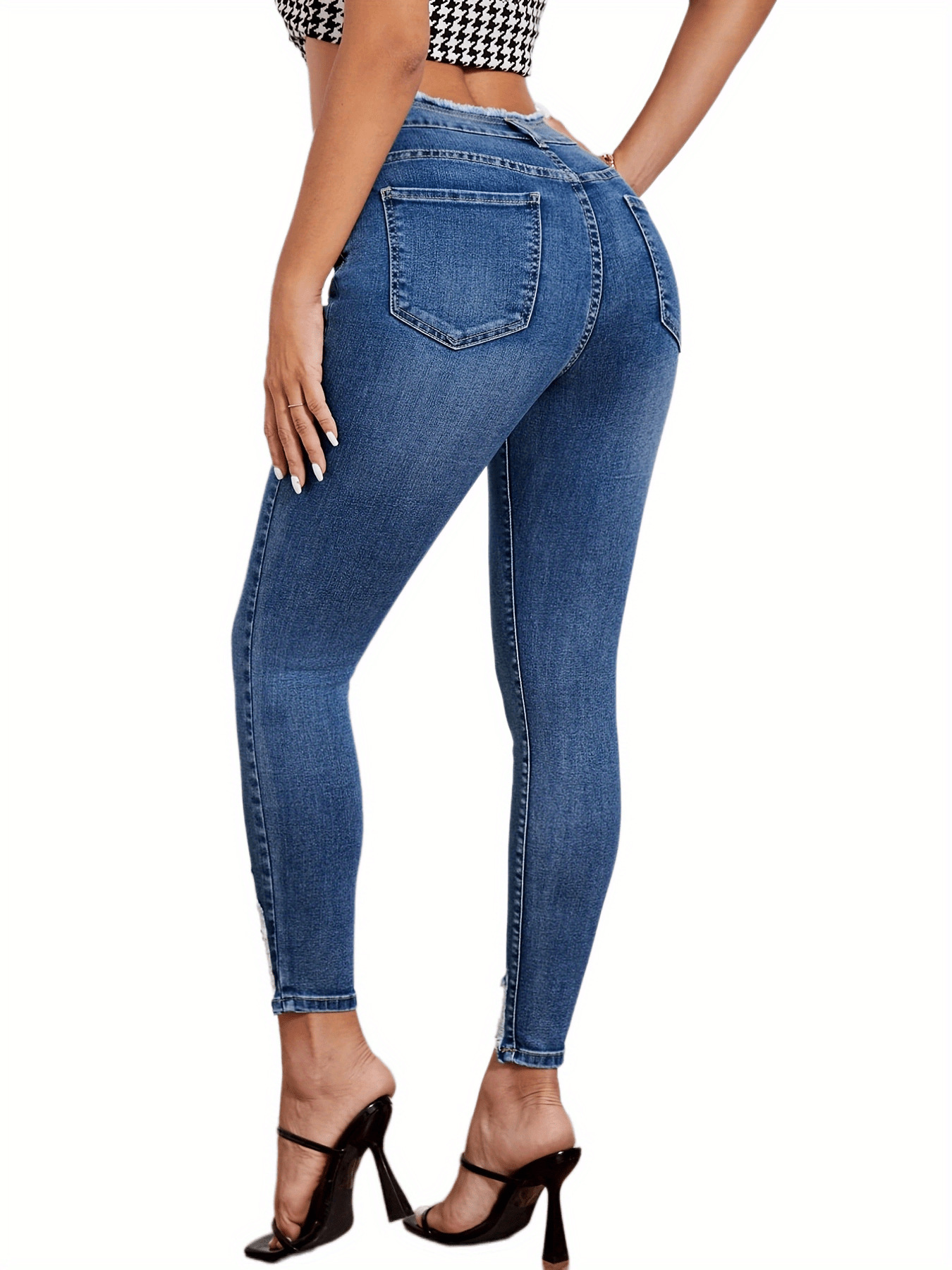 High Waist ripped elastic Jeans with Distressed Hem Detail